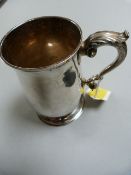 A hallmarked silver tankard, London 1931- weight 394.9 g.Maker- Goldsmiths & Silversmiths Co.Ltd