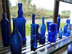 A quantity of various pieces of blue glass