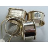 A pair of hallmarked silver napkin rings and two others- total weight 91.9g