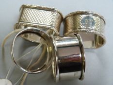 A pair of hallmarked silver napkin rings and two others- total weight 91.9g