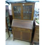 Oak bureau bookcase with leaded light features