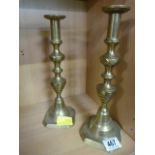 A pair of brass candlesticks