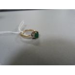 Emerald and diamond ring set in 9ct gold