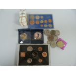 A small quantity of various coins, cigarette cards etc.