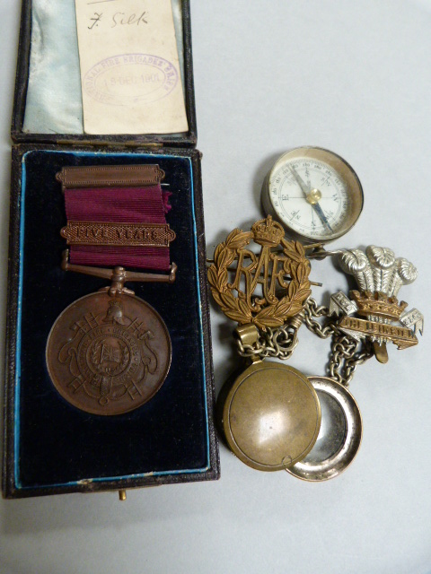 A Fire Brigade long service medal with 5 year bar ( awarded to 1414 F. Silk ), brass loupe,