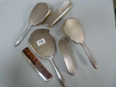 A hallmarked silver brush set comprising of six pieces