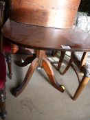 An elm rectangular tripod table with Gothic influence