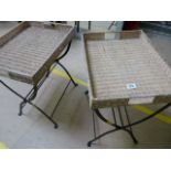 A pair of wicker butlers trays with metal stands