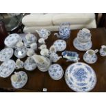 A large blue and white dinner service