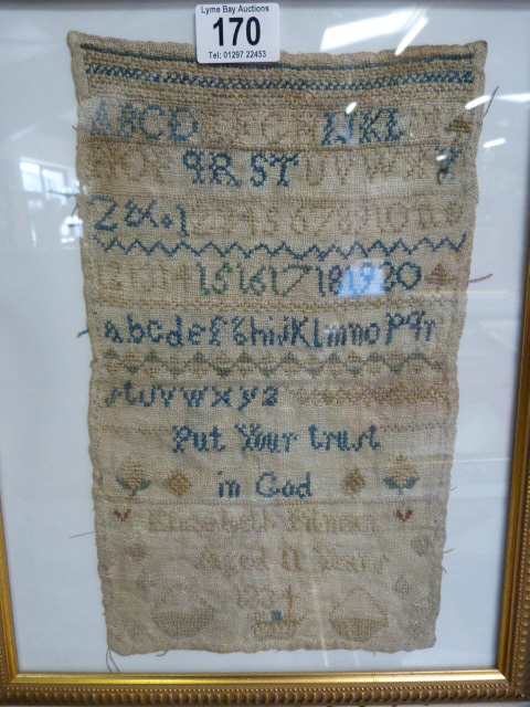 A Needlework Sampler in frame dated 1834 - Elizabeth Pilman Aged 11 years - 'Put your trust in God'