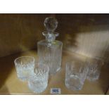 A Cut Glass Decanter and four mismatching glasses