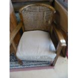 Bergere chair and a firescreen