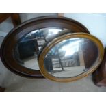 Large oval mirror and one other