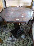 An inlaid coffee table with square tapering base