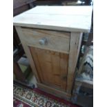 Tall pine bedside cupboard