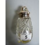 Cut glass sugar shaker with silver top