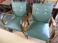 Two oak framed captains chairs