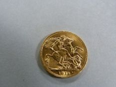 A George V 1914 sovereign- weight 8g
