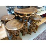 A wooden bar table and 3 bar stools