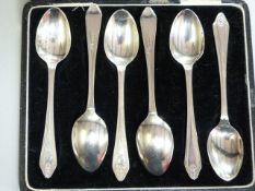 A cased set of hallmarked silver coffee spoons