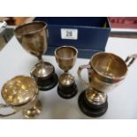 Four small hallmarked silver trophies