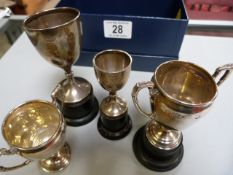 Four small hallmarked silver trophies