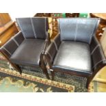 Pair of modern wooden framed leather chairs