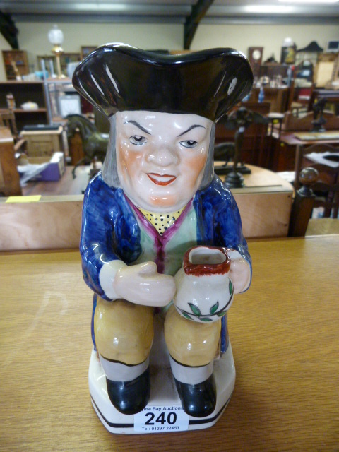 A Large toby style jug