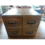 A Set of four retro wooden filing drawer