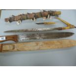 A machete and a horn handled knife