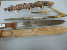 A machete and a horn handled knife