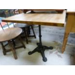 A square table with cast iron base