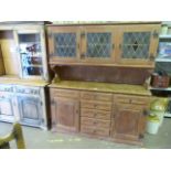 A Pitch pine dresser with leaded glass window to front