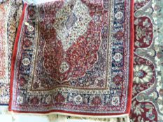 Red ground Kashmir rug