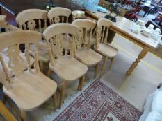 Large pine farmhouse table and 8 matching chairs