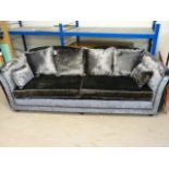 A Pair of large Italian bespoke made silver sofas.