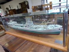 A scale model of the Tanker "DIOSKUROI" - shipyard built scale model - presented to the family on