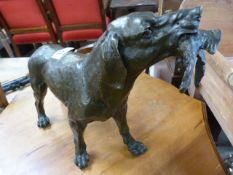 A Large bronze of a hunting dog with pheasant in mouth