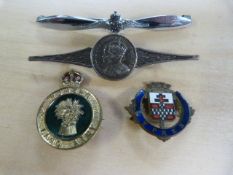 RAF badge set on a propeller, a George VI coronation badge, womans land army badge ( No pin) and