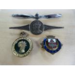 RAF badge set on a propeller, a George VI coronation badge, womans land army badge ( No pin) and