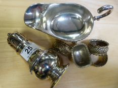 Three hallmarked silver serviette rings, plated sugar shaker and a sauceboat