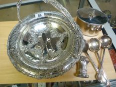 A silverplated bowl and hallmarked silver spoons in a tea caddy etc