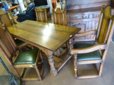 An oak refrectory type table and 6 chairs