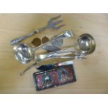 Small quantity of ladles, silver handled fork, medallions etc.