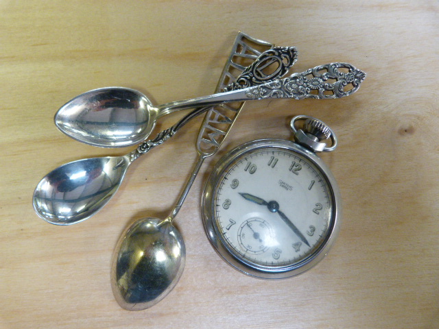 A Smiths pocket watch and three continental spoons