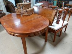 Oriental Dining table with extending leaf and six chairs