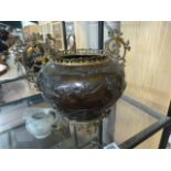 A bronze censer with gilt mountings decorated with exotic birds