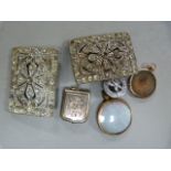 A hallmarked silver locket, 9 ct Locket and three silver pieces