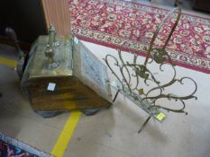 A brass coal bin and shovel and a brass magazine rack