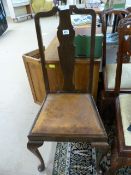 A Pair of upholstered seated chairs on claw and ball feet and one other